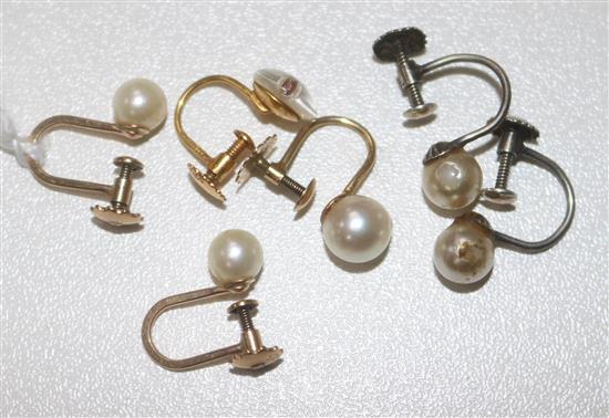 Six assorted ear clips including three 9ct gold and cultured pearl, two silver and one odd clip.